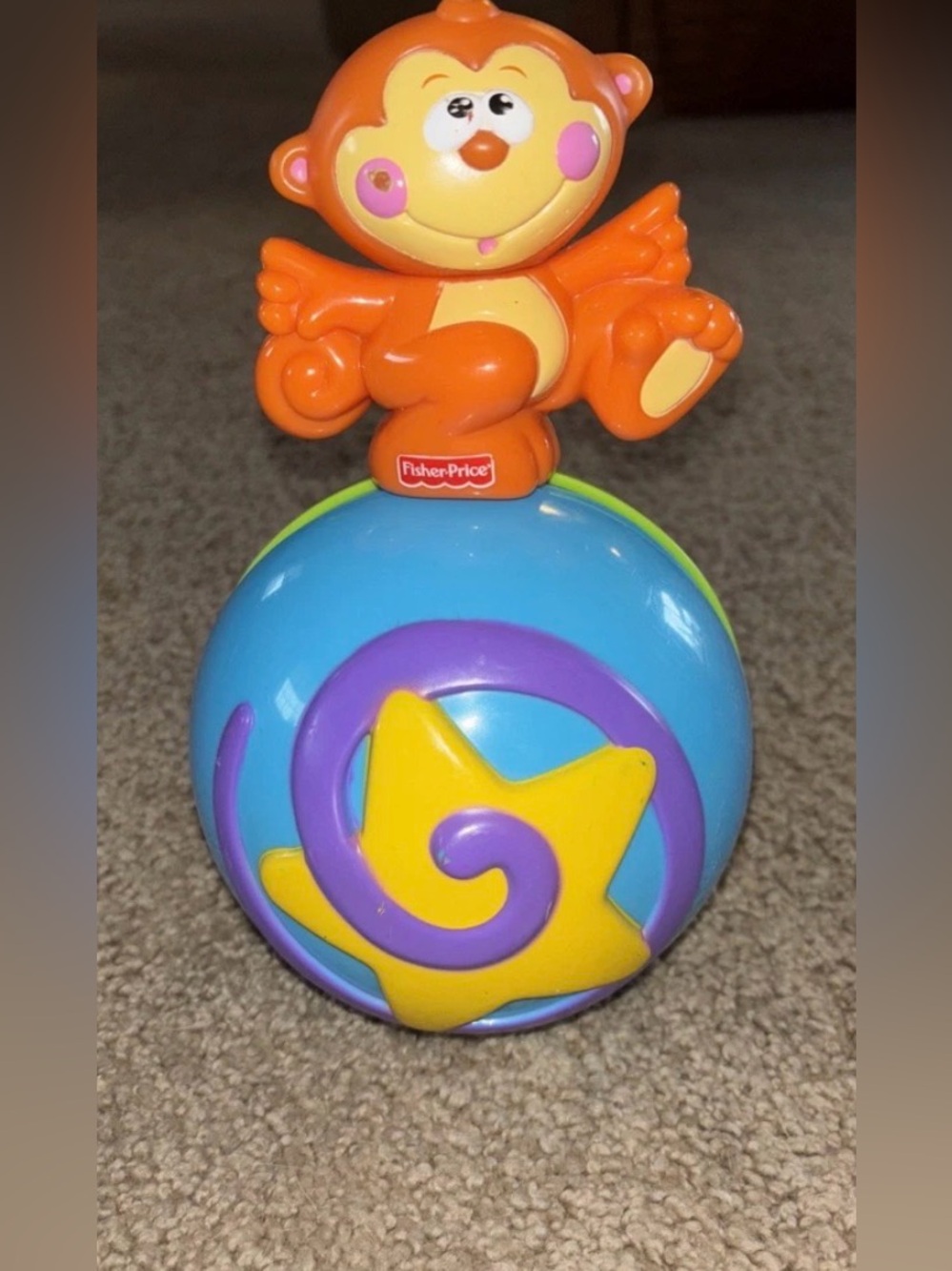 Fisher price monkey roller